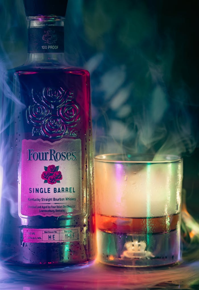 Elegant bottle of Four Roses Single Barrel with colorful smoke effect